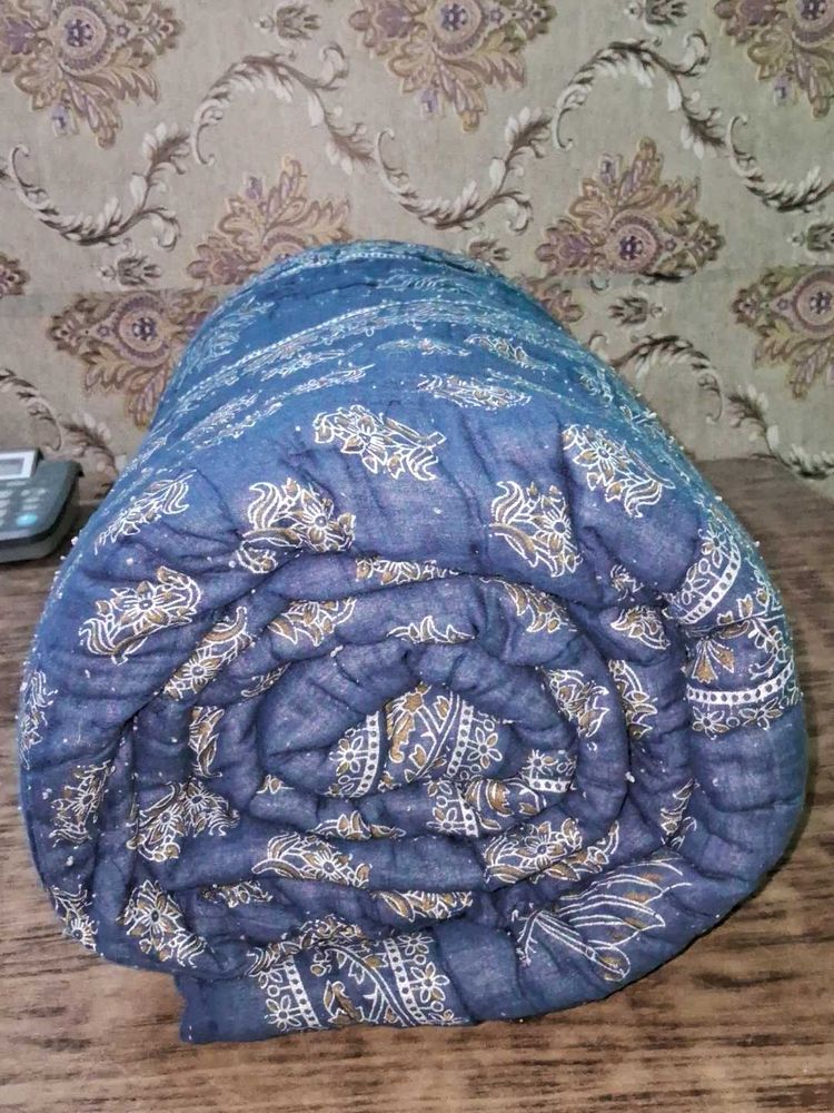 Blue Patterned Quilt Wait 1.850