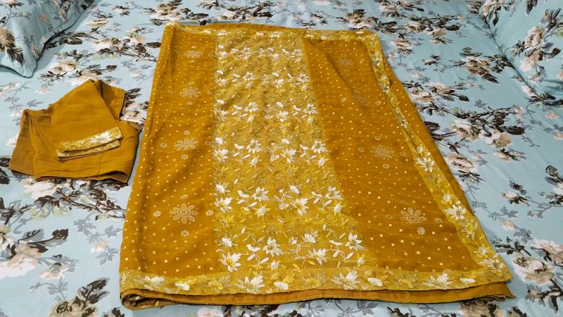 fix rate mustard totally new sari with stitch blou