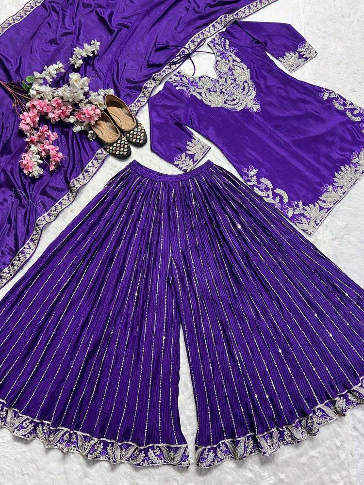Stunning Purple Embroidered Kurta Set