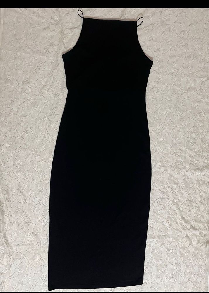 Sleek Black dress with sheer cape