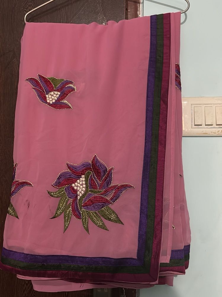 Elegant Pink Saree with Floral Embroidery