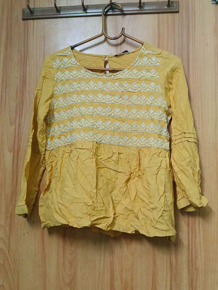 Yellow Embroidered Peplum Top