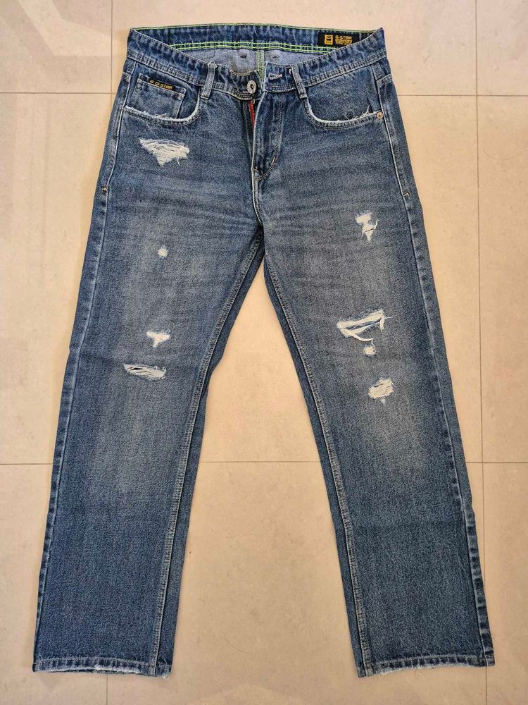 Distressed Blue Denim Jeans