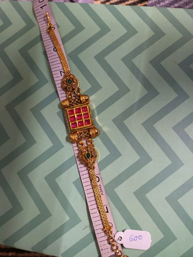 Gold Tone Bajuband with Red and Green Stones