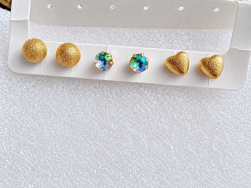 Set of 4 Gold Tone Earrings