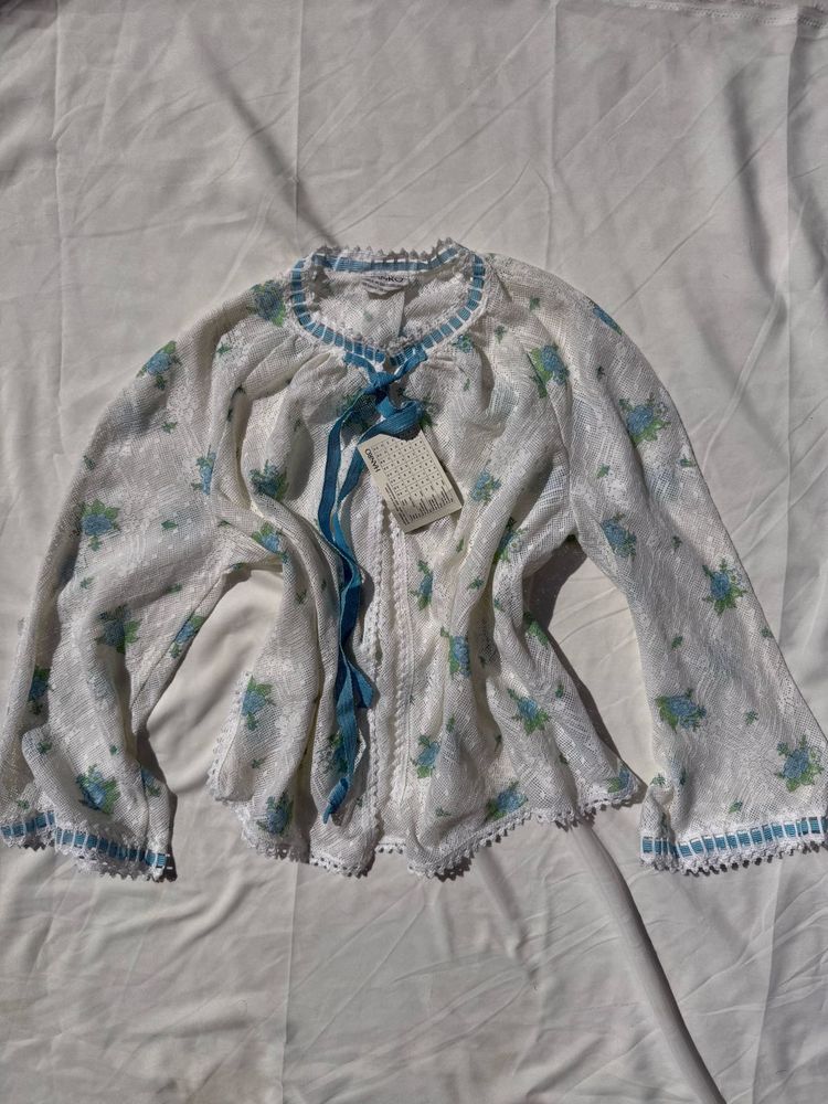 White Floral Blouse with Blue Ribbon