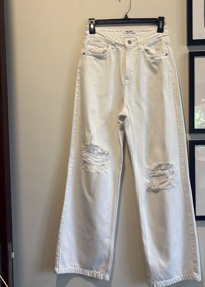 Cream Distressed Wide-Leg Jeans