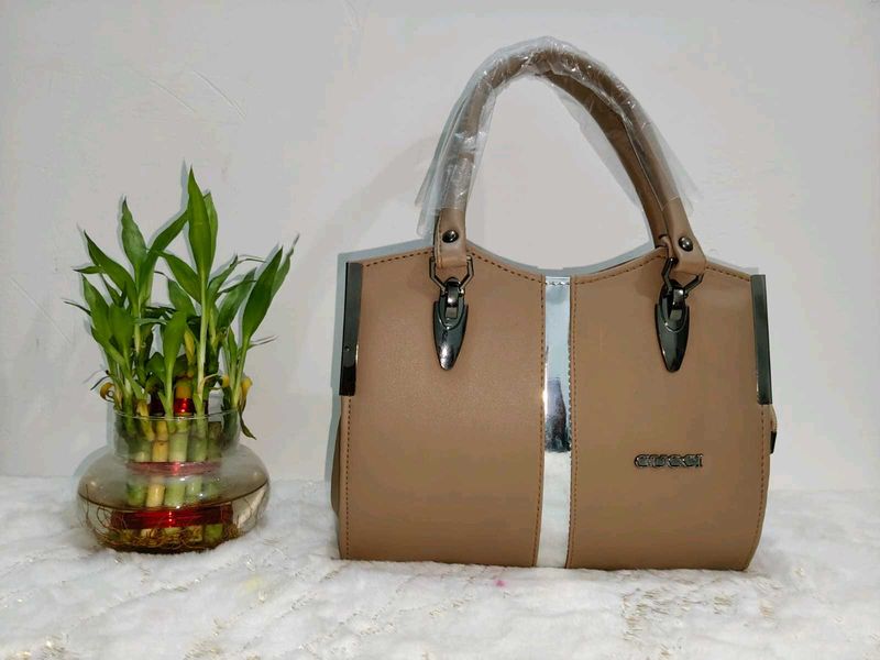 Elegant Beige Handbag with Silver Accent