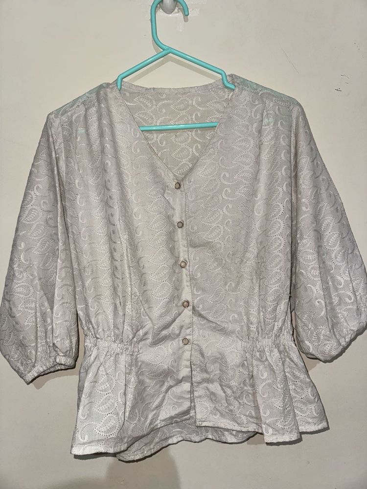 Elegant White Embroidered Peplum Top
