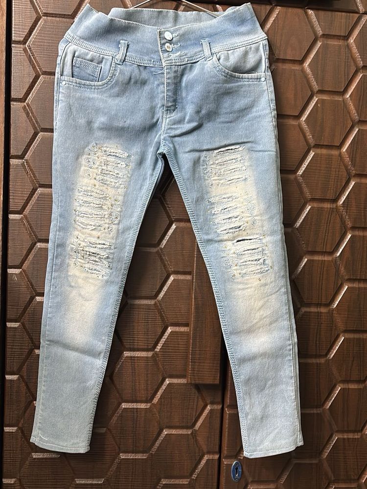 Distressed Light Wash Denim Jeans