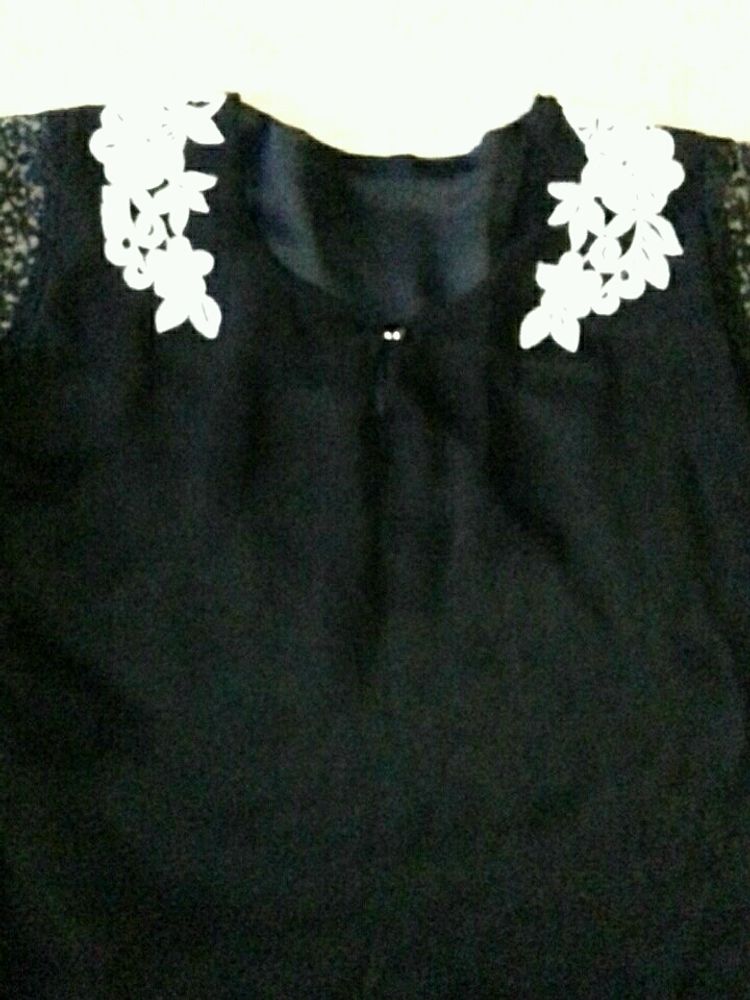 Top With net Sleeve. Size 34in . 2,3 time used.