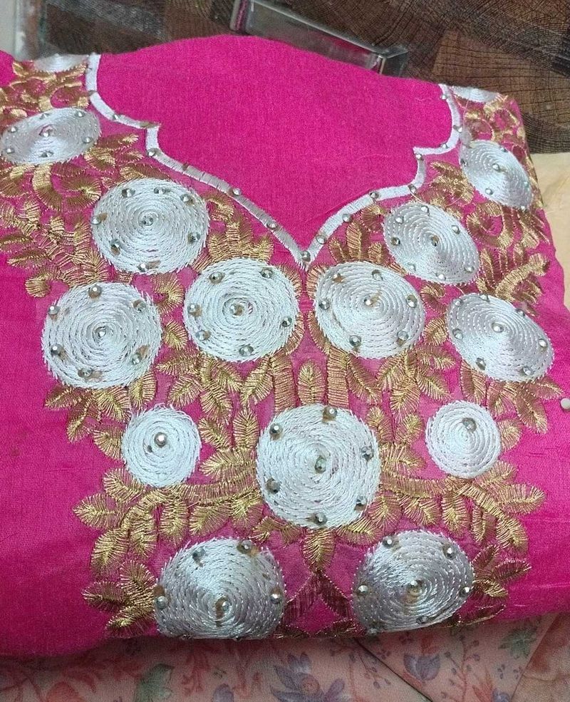Embroidered dress material