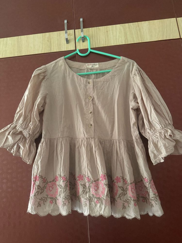 Embroidered Peplum Blouse
