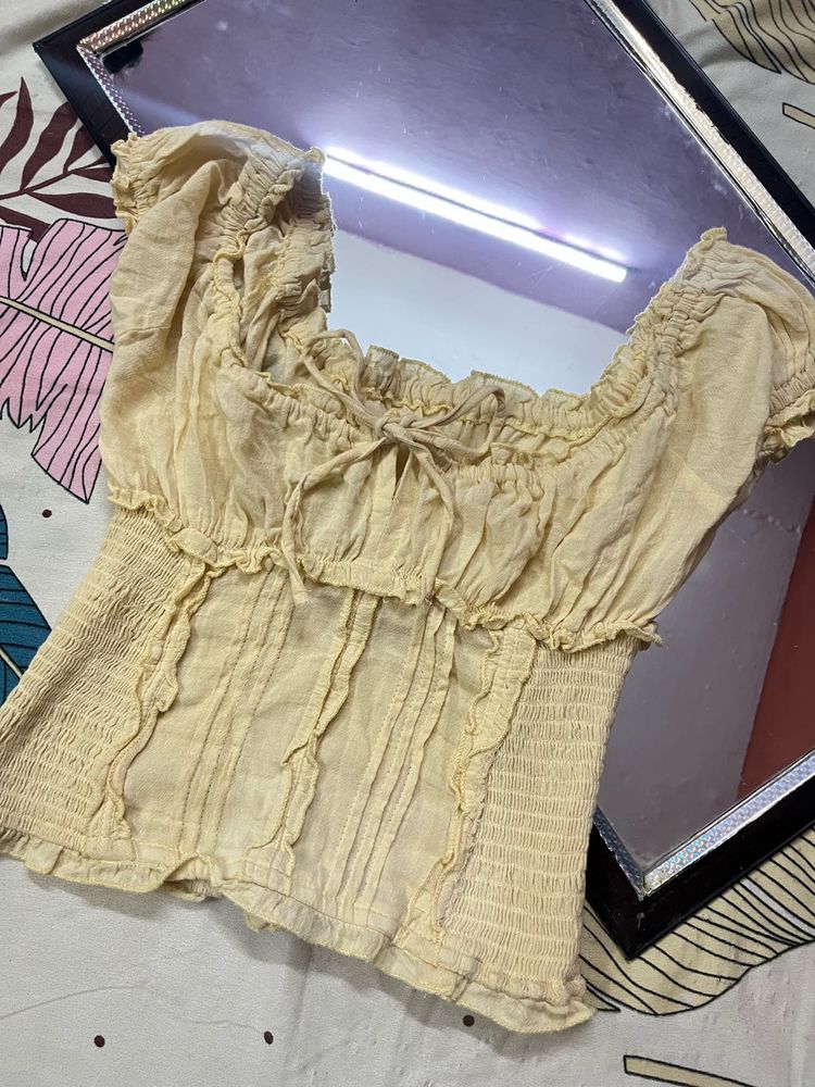 Sheer Ruffle Tie Front Top
