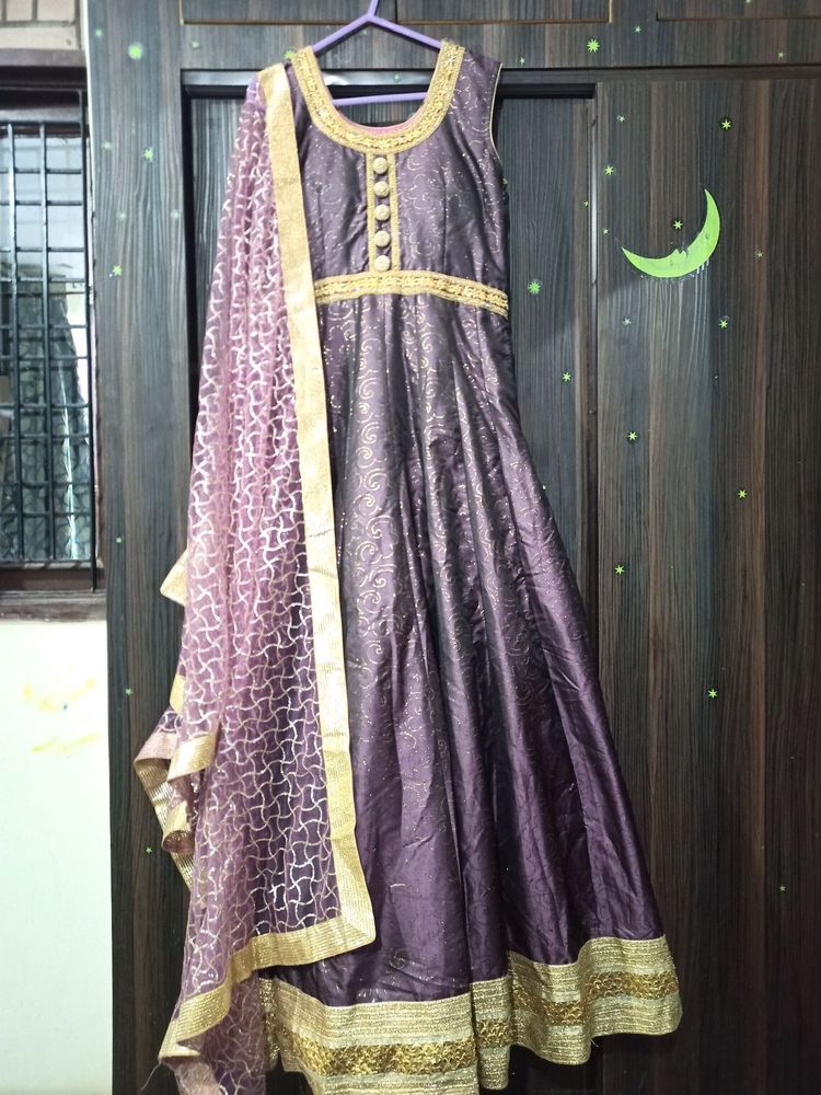 beautiful purple color heavy gown with bottom and dupatta