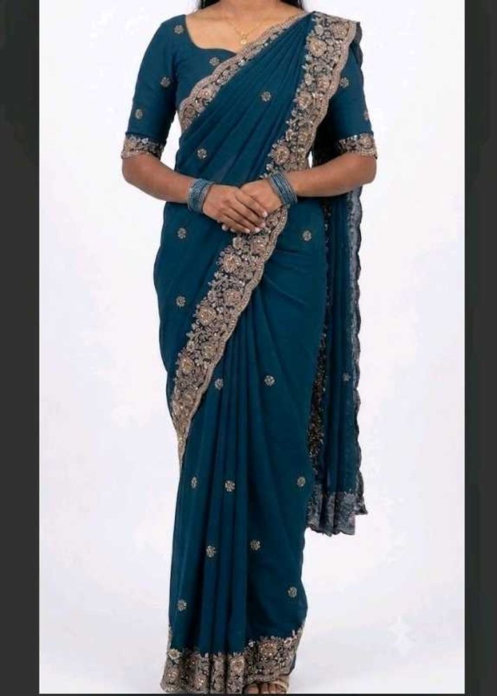 Elegant Teal Embroidered Saree