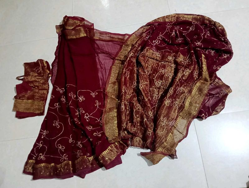 Elegant Maroon Embroidered Saree