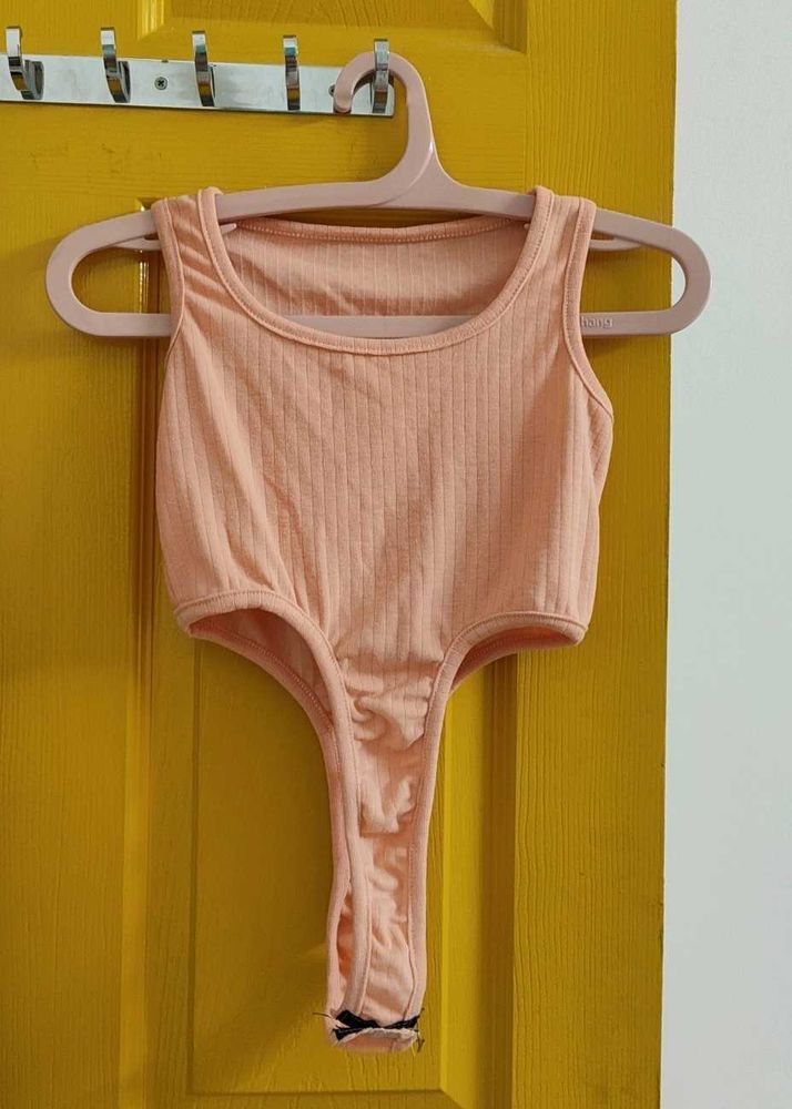 Peach Ribbed Bodysuit