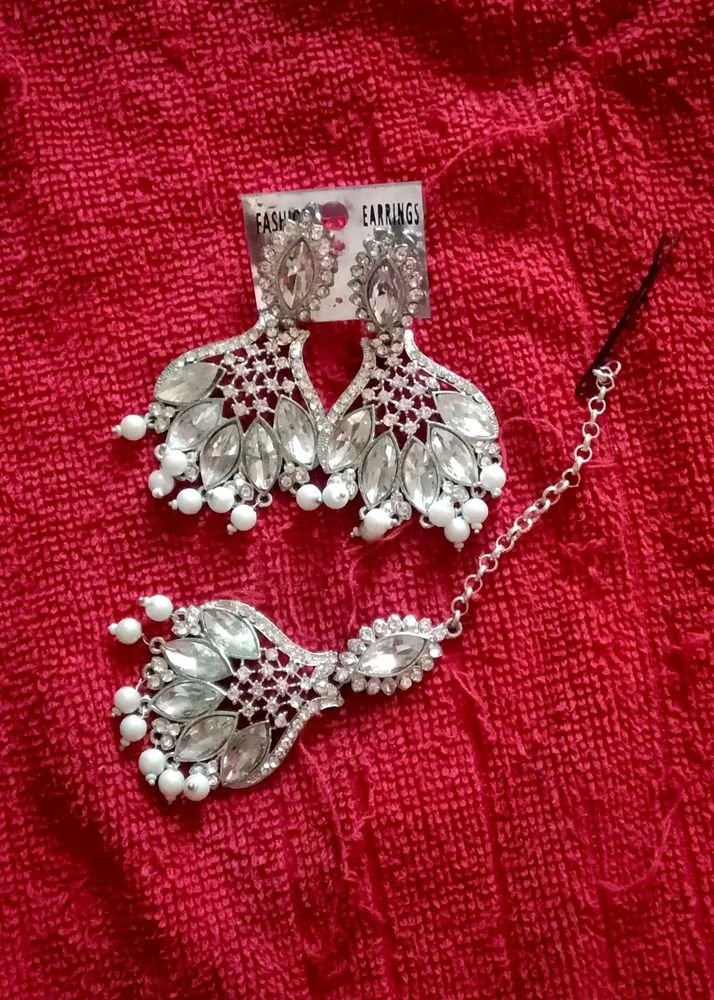 Earrings with  mag tika diamond