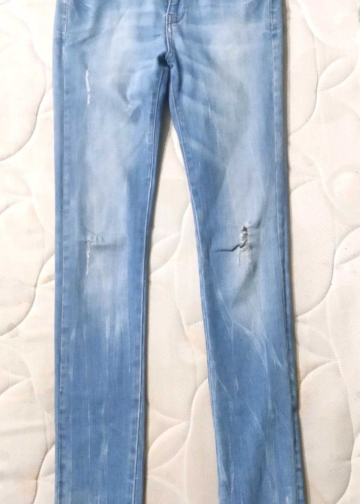 Light Wash Distressed Skinny Jeans