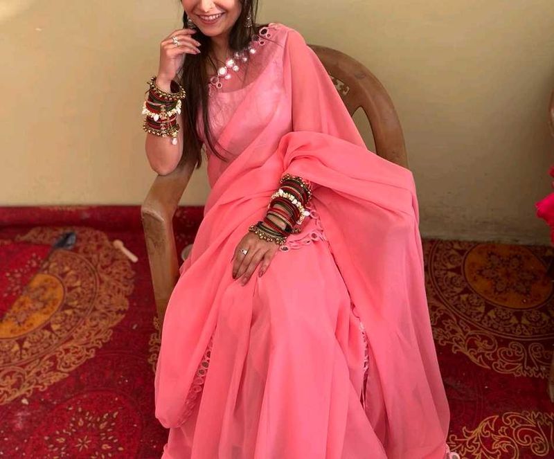 Elegant Pink Saree with Mirror Work Border