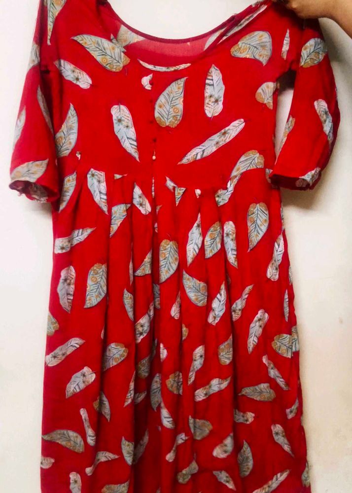 girls red frock + gift