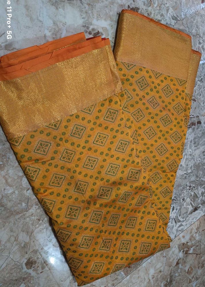 Beautiful Yellow Saree with Golden Border