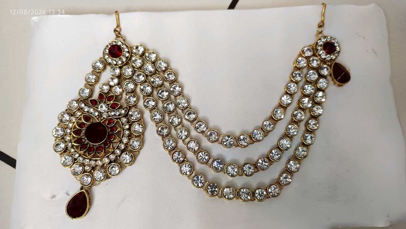 Exquisite Kundan Maang Tikka with Red Stone