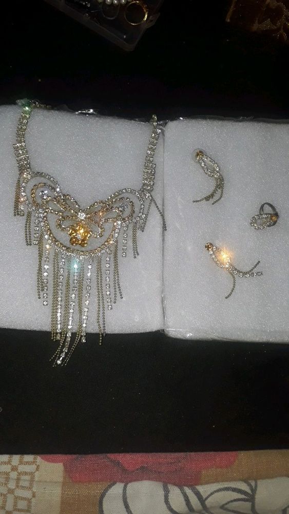 nacklace with earrings and ring