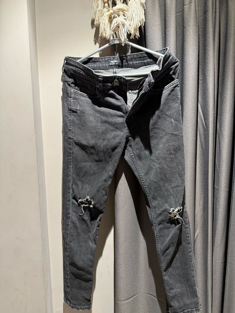 Distressed Gray Denim Jeans