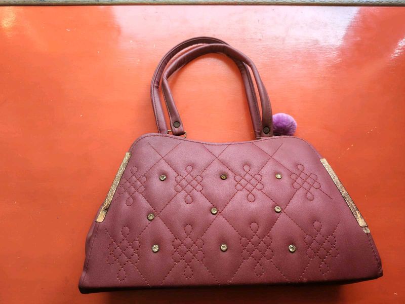 Quilted Handbag with Embellishments