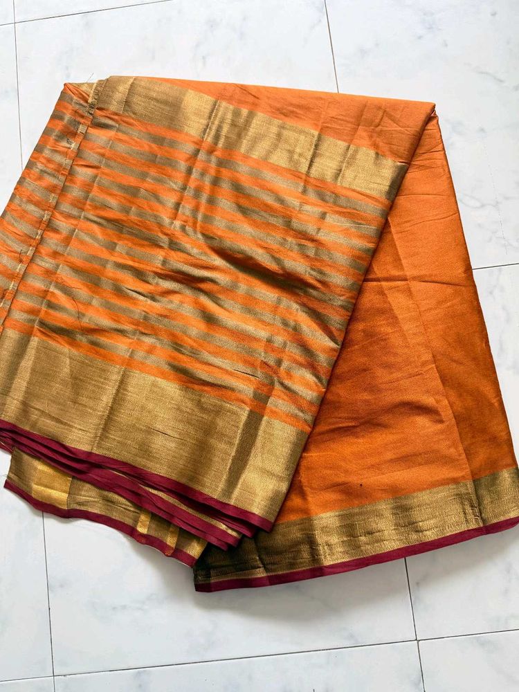 Vibrant Orange Saree with Golden Stripes