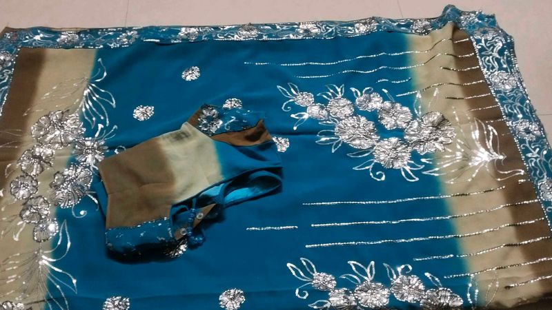Stunning Teal Blue Saree with Silver Embellishment