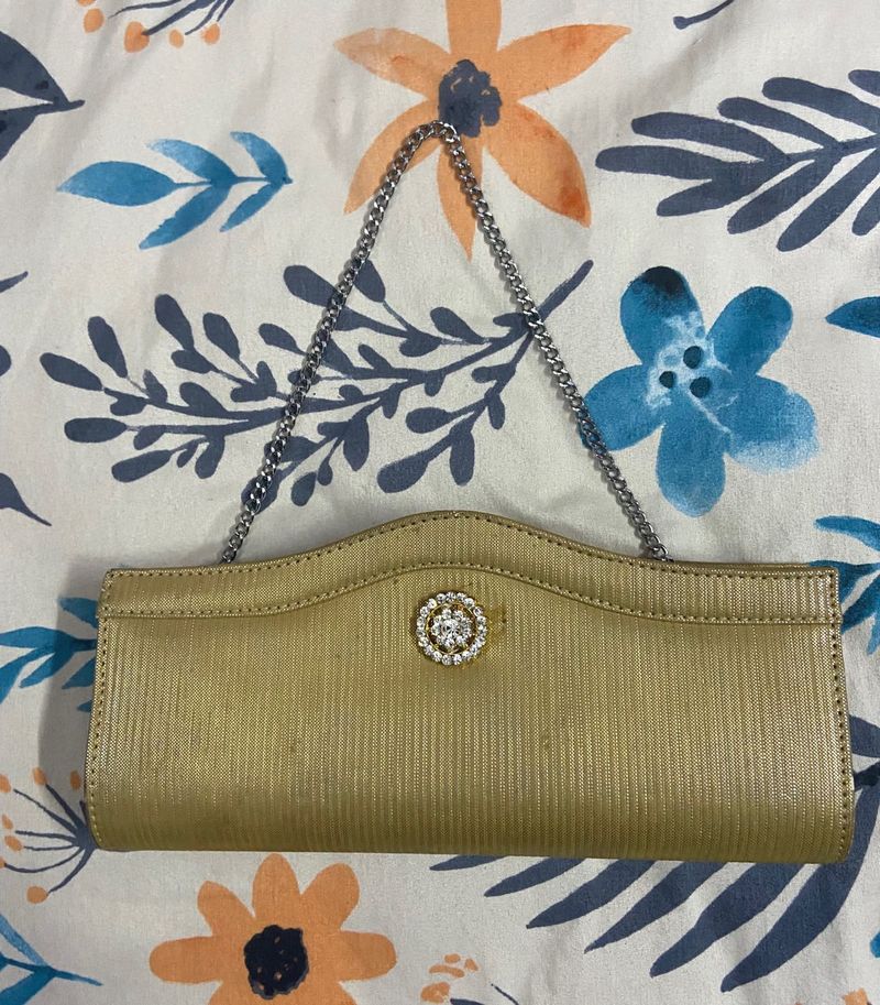 Elegant Gold Clutch with Embellishment
