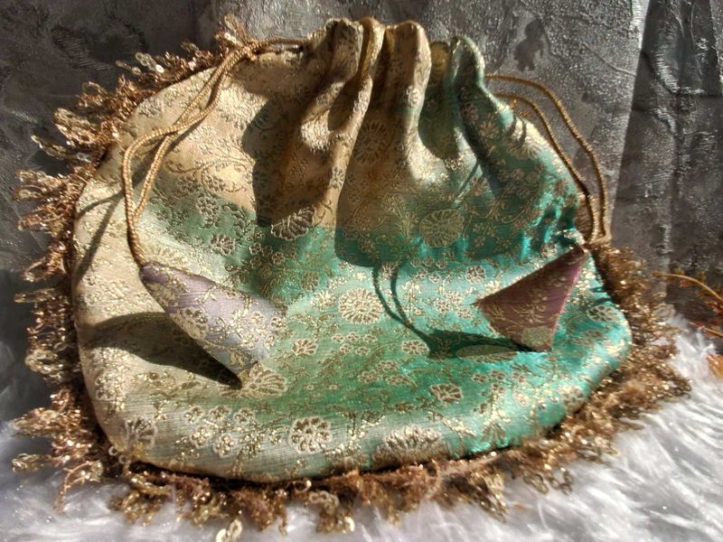 brocade pastel color potli bag