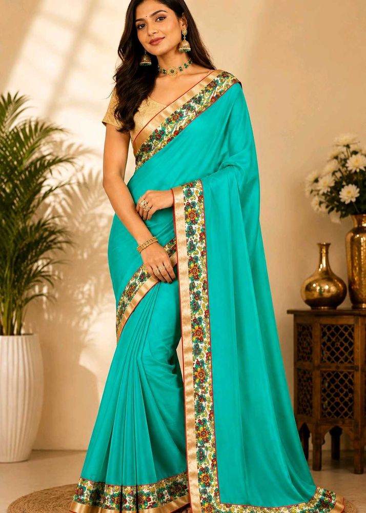 Stunning Teal Saree with Floral Border
