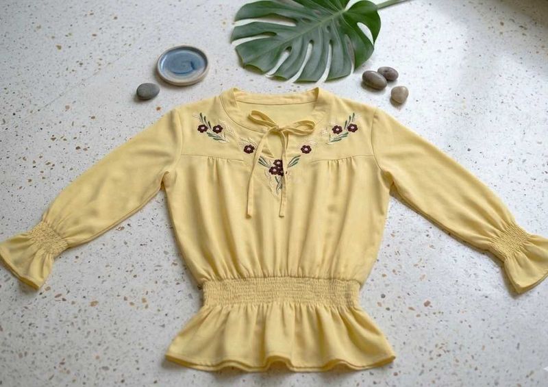 Embroidered light yellow top