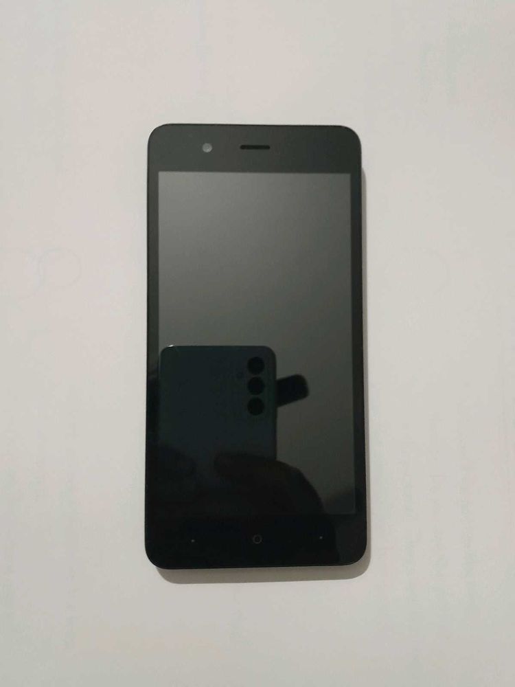 Used Black Smartphone • Battery Missing