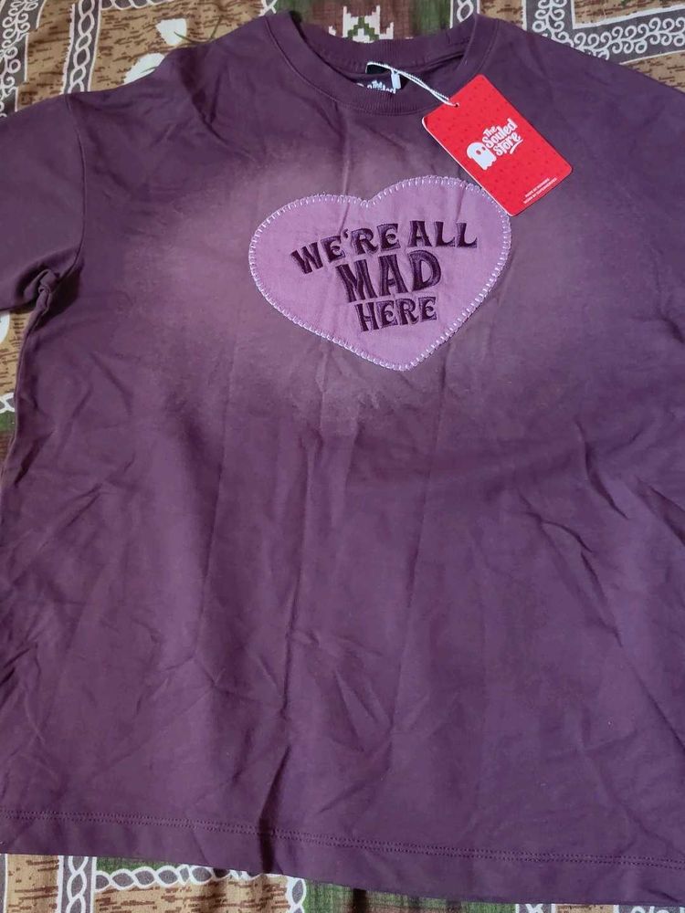 Purple "We're All Mad Here" Graphic Tee