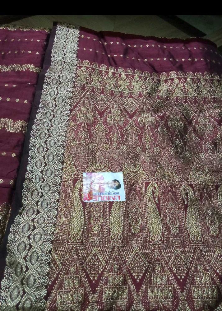 Exquisite Maroon Silk Saree with Gold Zari