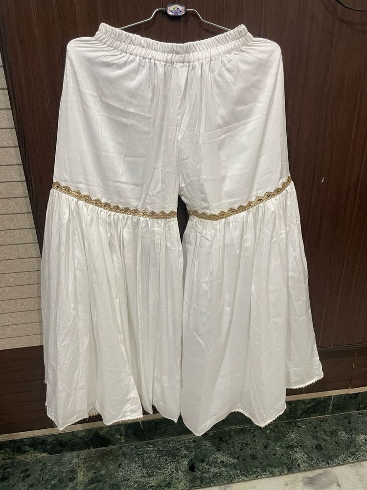 Elegant White Palazzo Pants with Gold Trim