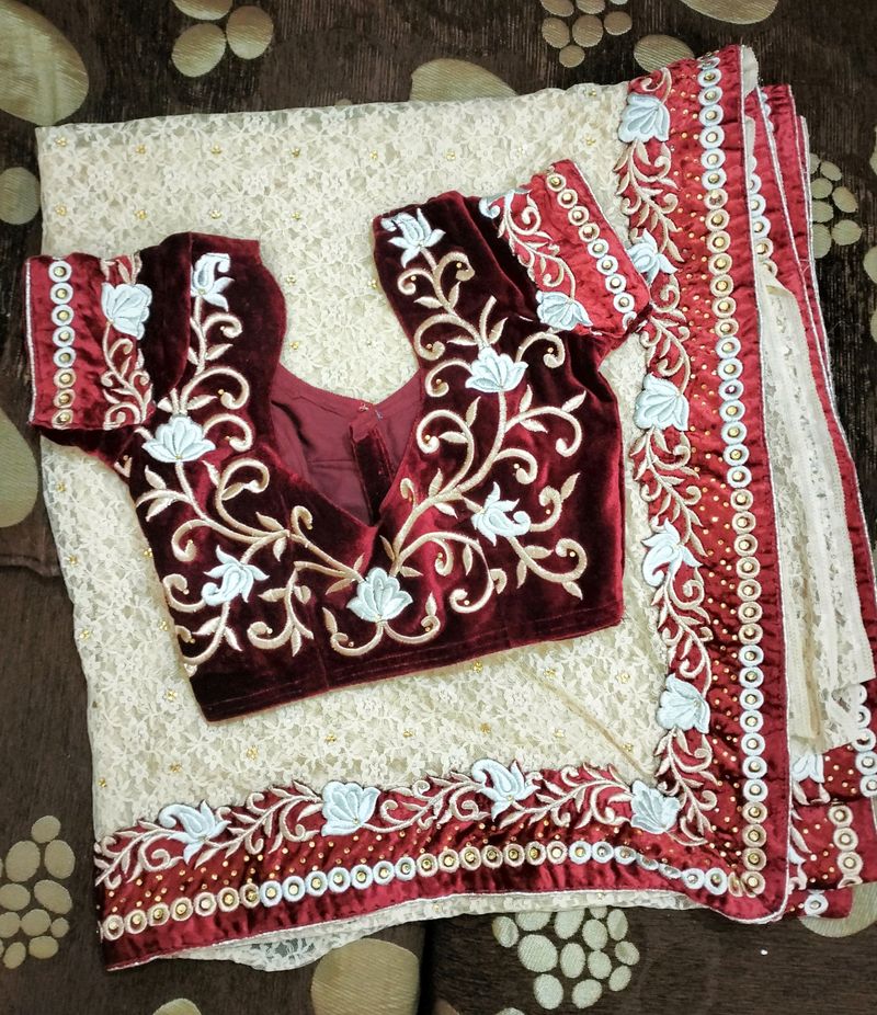 Designer Saree With Red Velvet Blouse And Border
