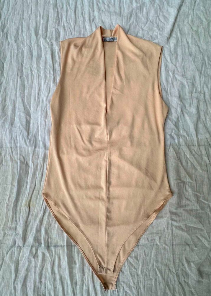 Sleek Peach Bodysuit