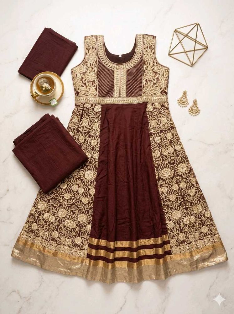 beautiful broun clr gown with embroidary work