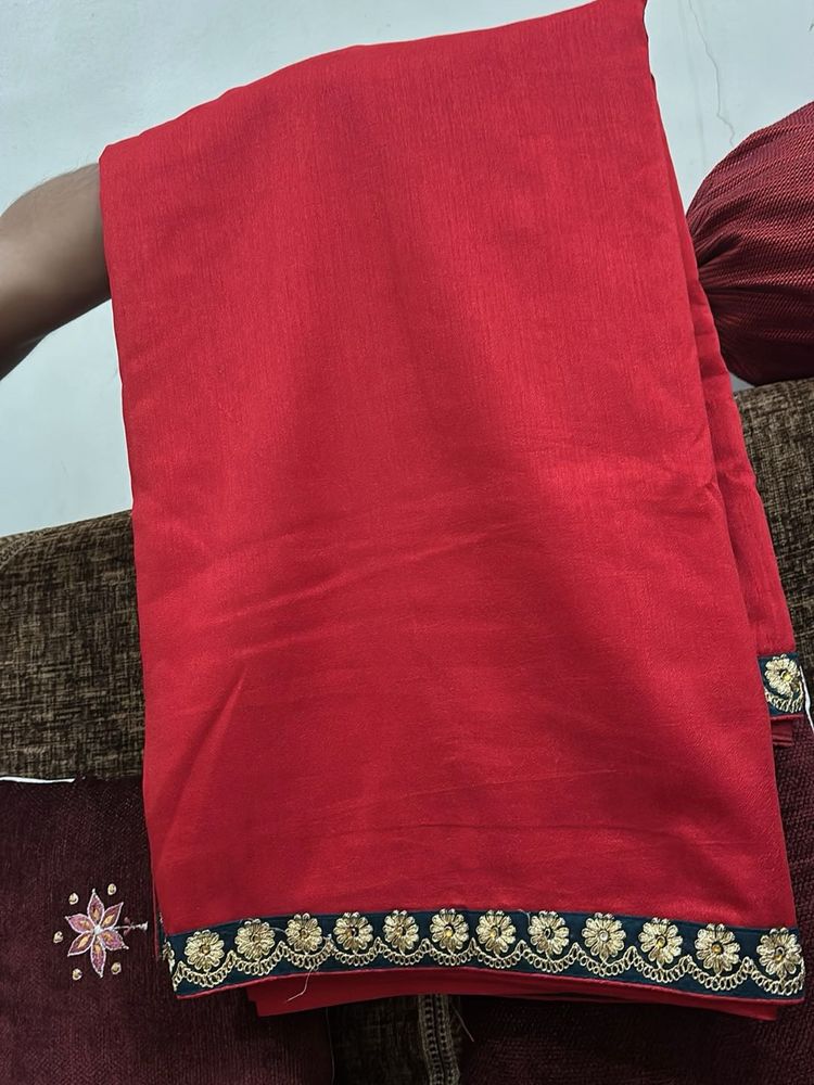 Elegant Red Saree with Floral Border