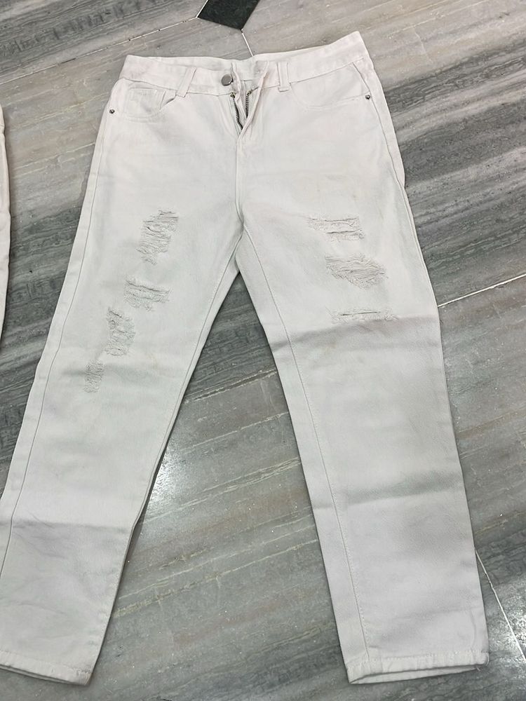 Distressed Light Wash Denim Jeans