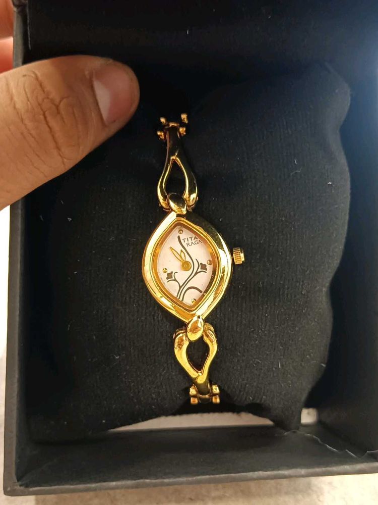 Elegant Gold Tone Titan raga Watch