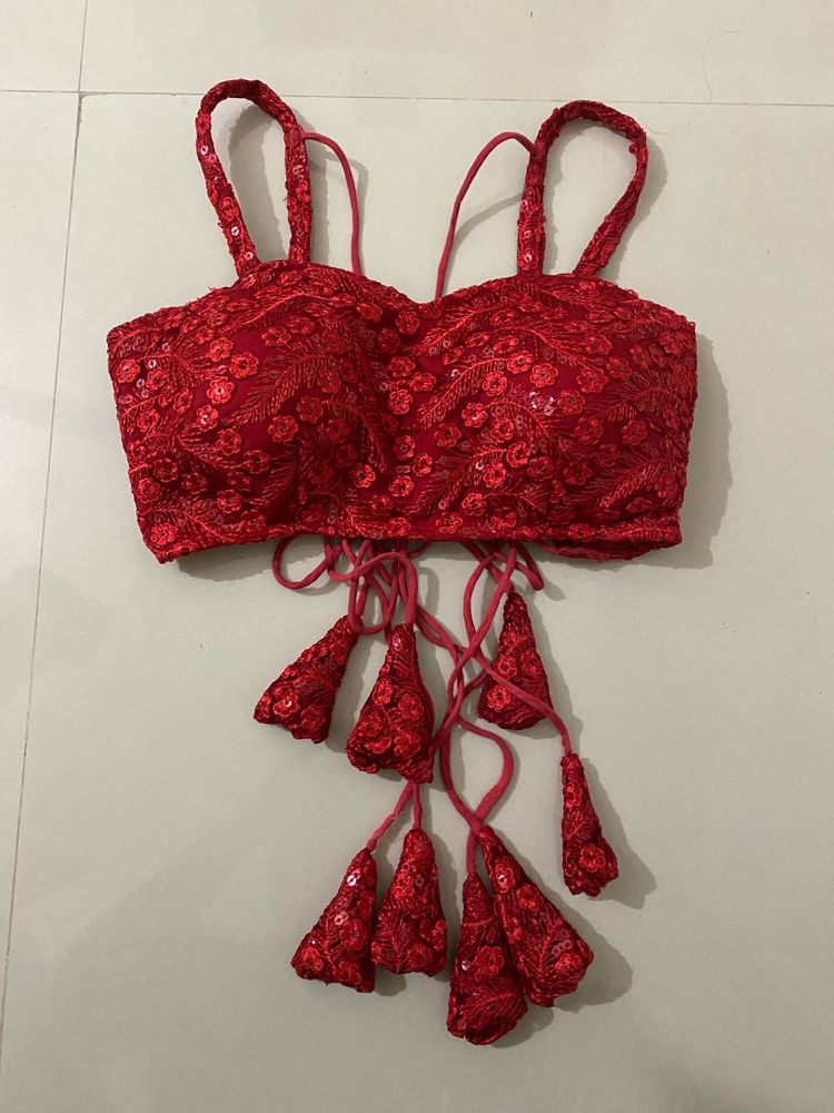 red backless blouse