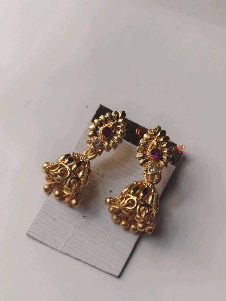 Elegant Gold Jhumka Earrings with Stone