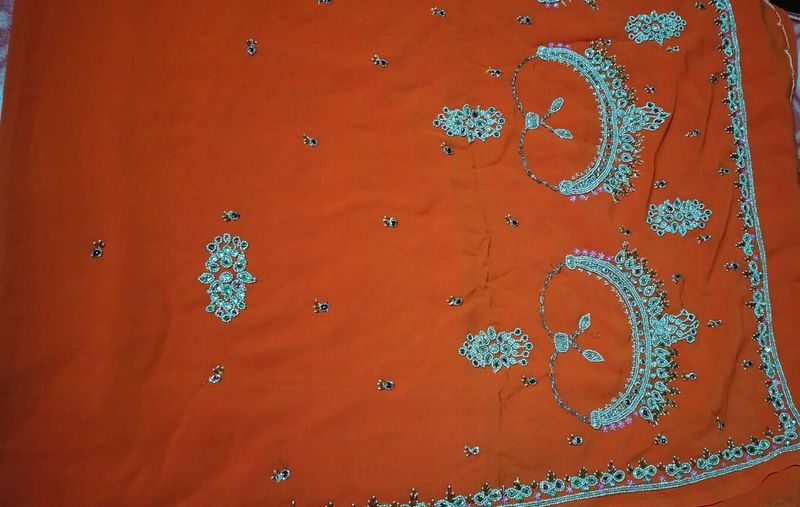 Elegant Orange Embroidered Saree